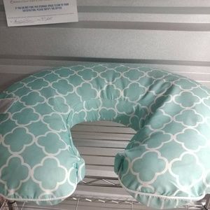 Two nursing pillows and an extra Boppy cover +